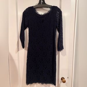 Diane Von Furstenberg. Size 0. Navy short fitted lace dress.